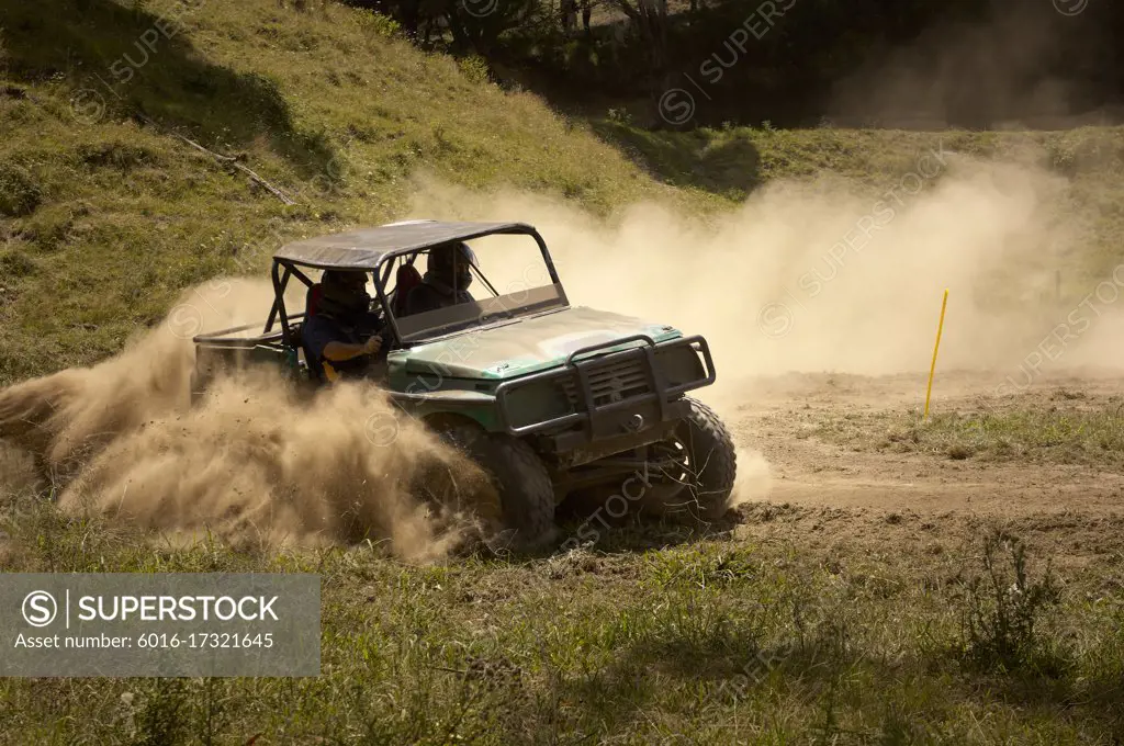 Four Wheel Drive vehicles racing on extreme off road course in competition