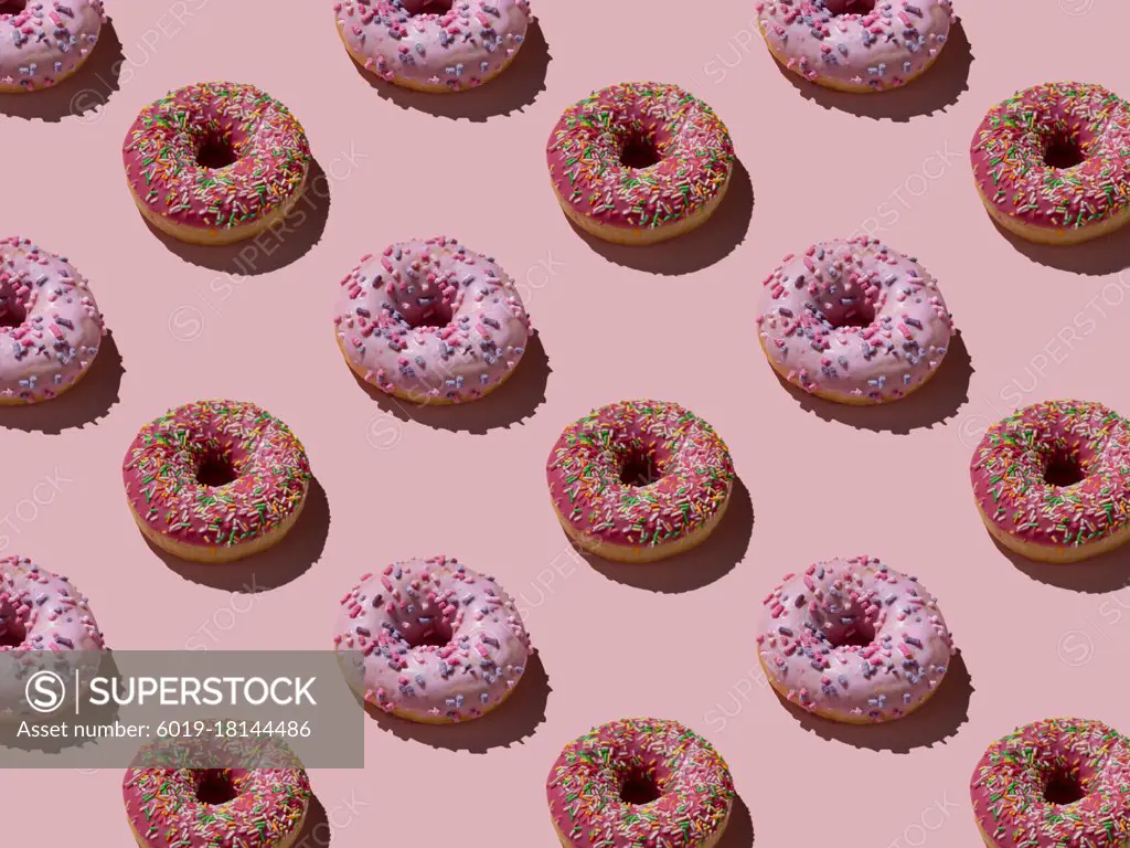 doughnuts on a pink background pattern
