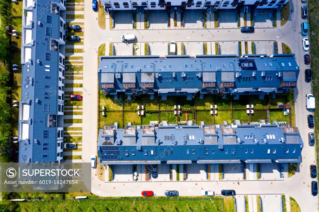 Aerial view of residential houses neighborhood and apartment bui