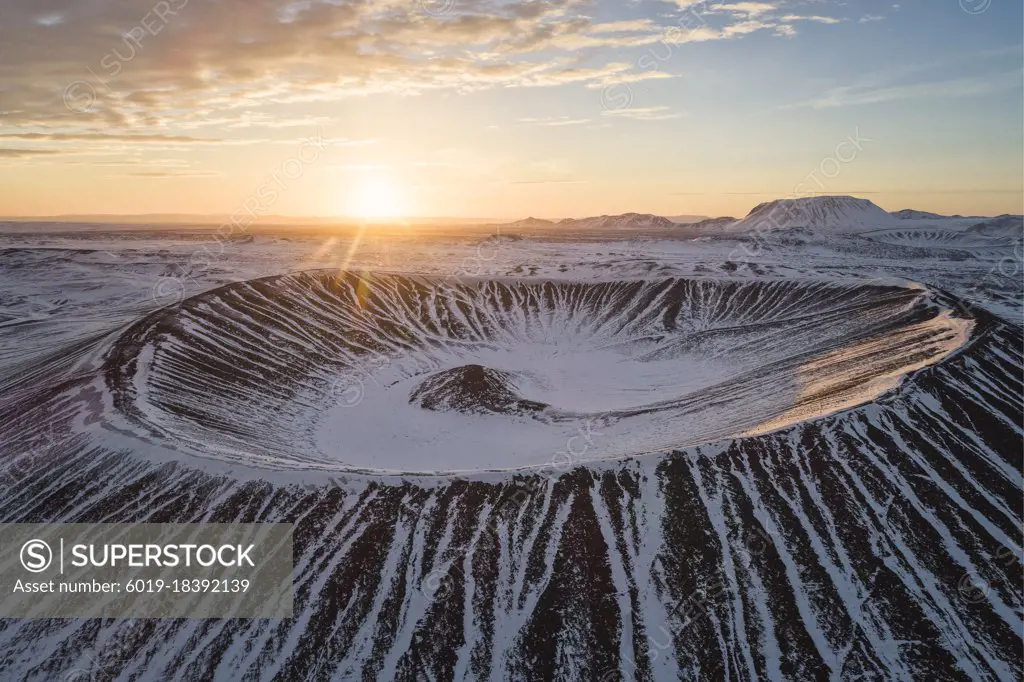 Hverfjall volcano crater from aerial view at sunrise