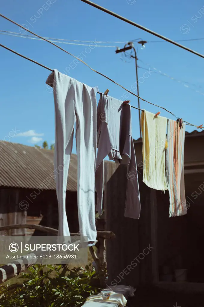 Clothes drying on clothesline on sunny day