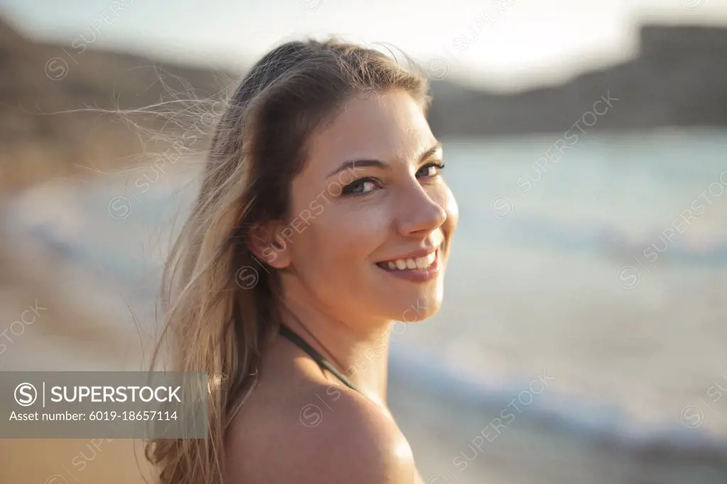 portrait of young woman at the sea