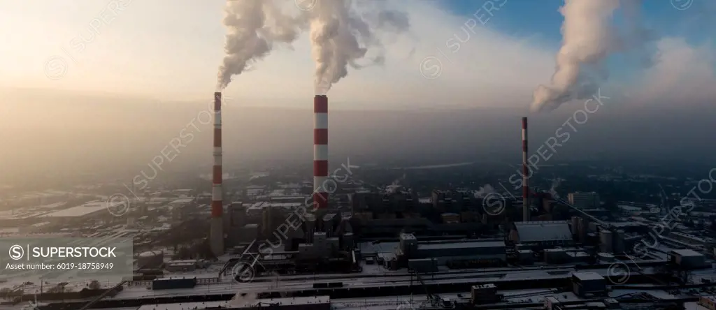 Aerial view of Industrial zone, plants and factories with smoke 