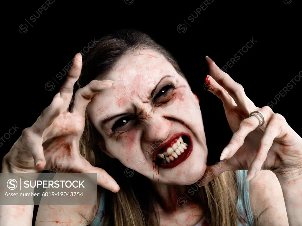 A Female Undead Zombie over Black Background