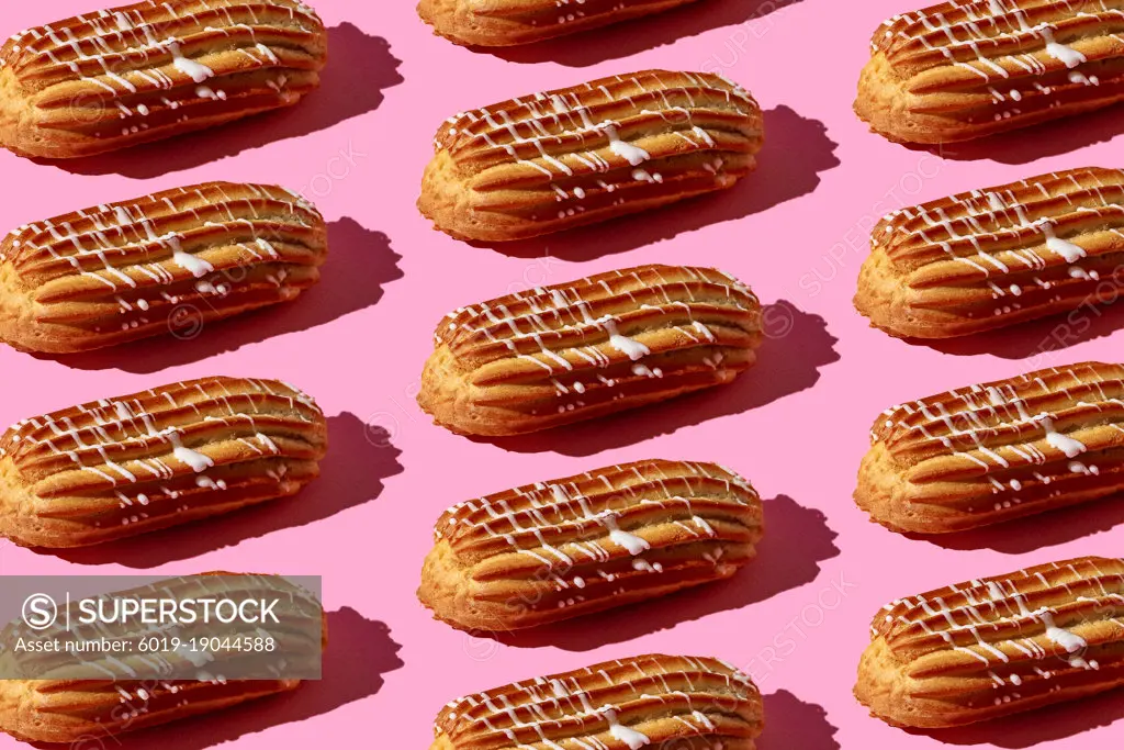 pattern of eclairs on a pink background