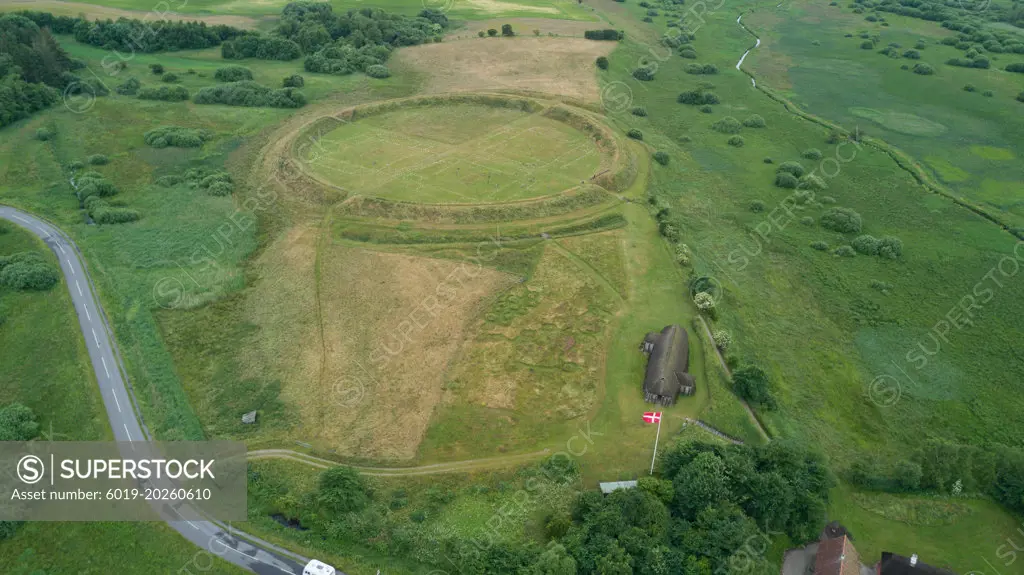 Aerial view around the Fyrkat Viking ring castle ruins - drone shot