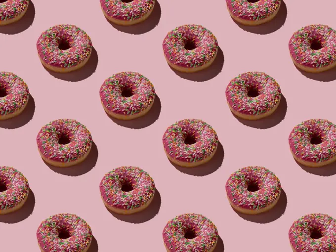 doughnuts on a pink background pattern