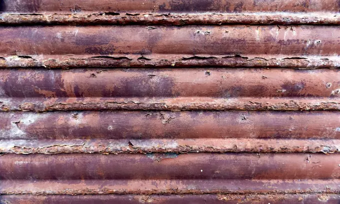 Textures and details of rusty metal shutter for background