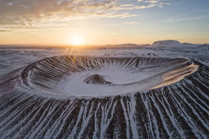 Hverfjall volcano crater from aerial view at sunrise