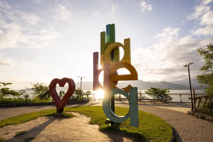 Beautiful view to Ilhabela big touristic heart and letter monument