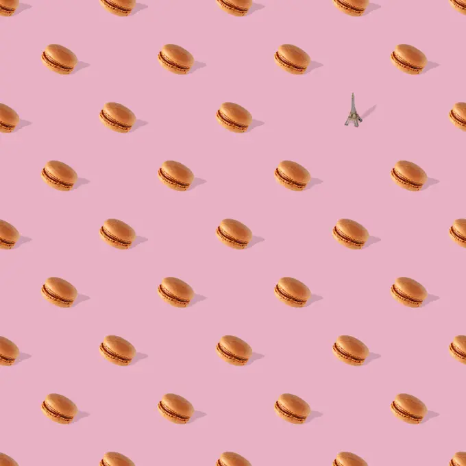 macaroons with shadow on pink background, seamless pattern
