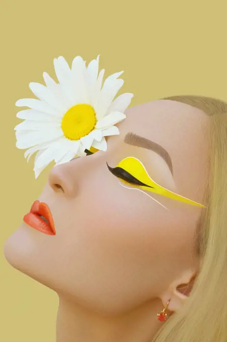 Asian Girl With Camomile Flowers