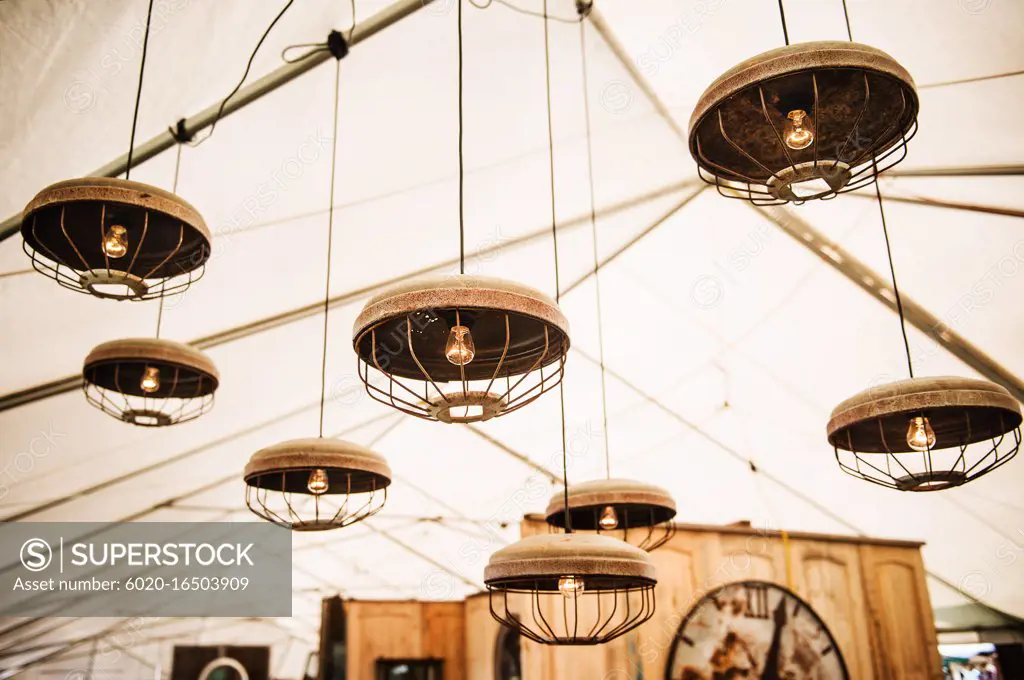 Antique lighting fixtures for sale at a flea market