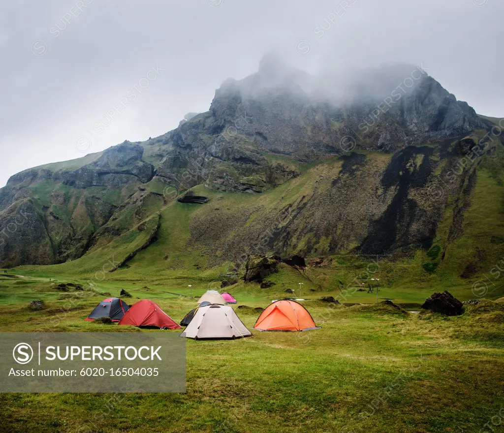 Tents camping in Herjólfsdalur valley on Heimaey island, Westman islands, Iceland, Scandinavia, Europe