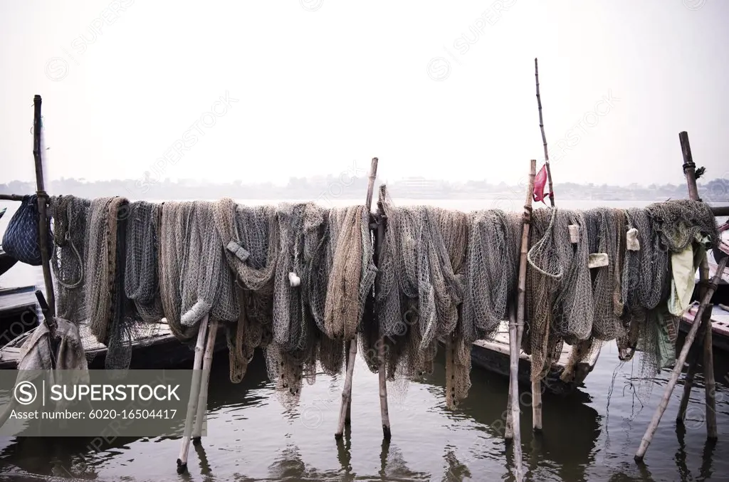 fishing nets drying in the sun by the Ganges River, Varanasi, India