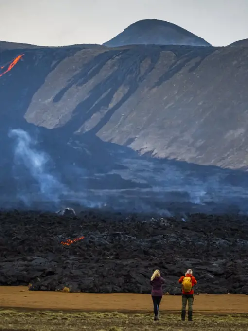 Local Icelanders visiting lava flows from Fagradalsfjall Volcano, Iceland