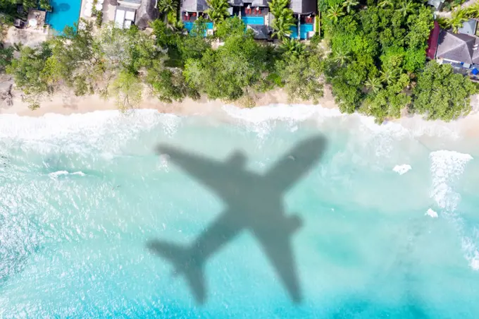 Travel traveling vacation sea symbolic picture airplane flying Seychelles beach water image