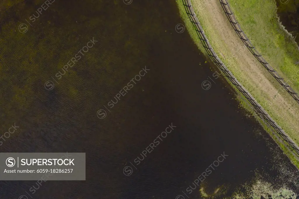 Aerial photograph of a horse trotting track near a fresh water lake in New South Wales in regional Australia