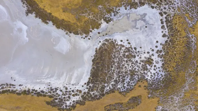 Aerial view of a water supply turned to salt by severe drought