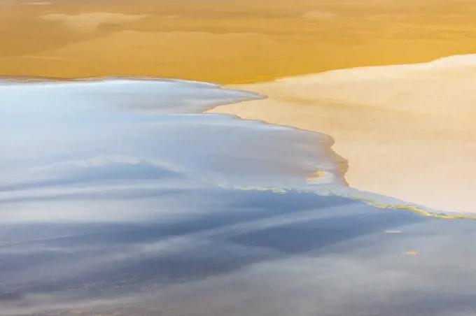 Australian Outback Aerial over Lake Eyre showing blue water and yellow sand