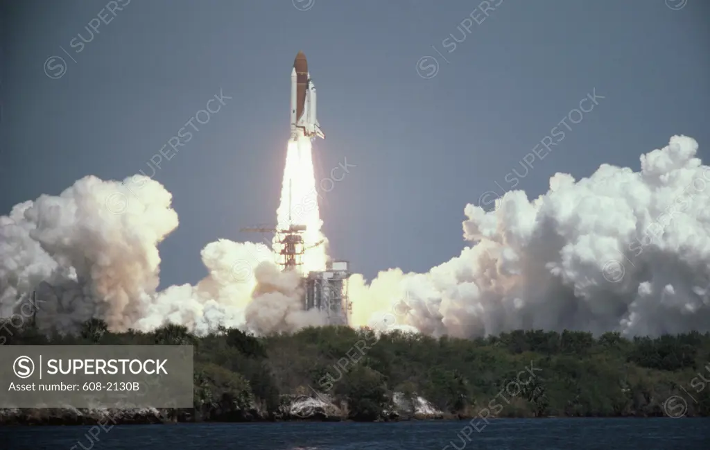 Low angle view of a space shuttle taking off from a launch pad, Space Shuttle Challenger, Kennedy Space Center, Cape Canaveral, Florida, USA