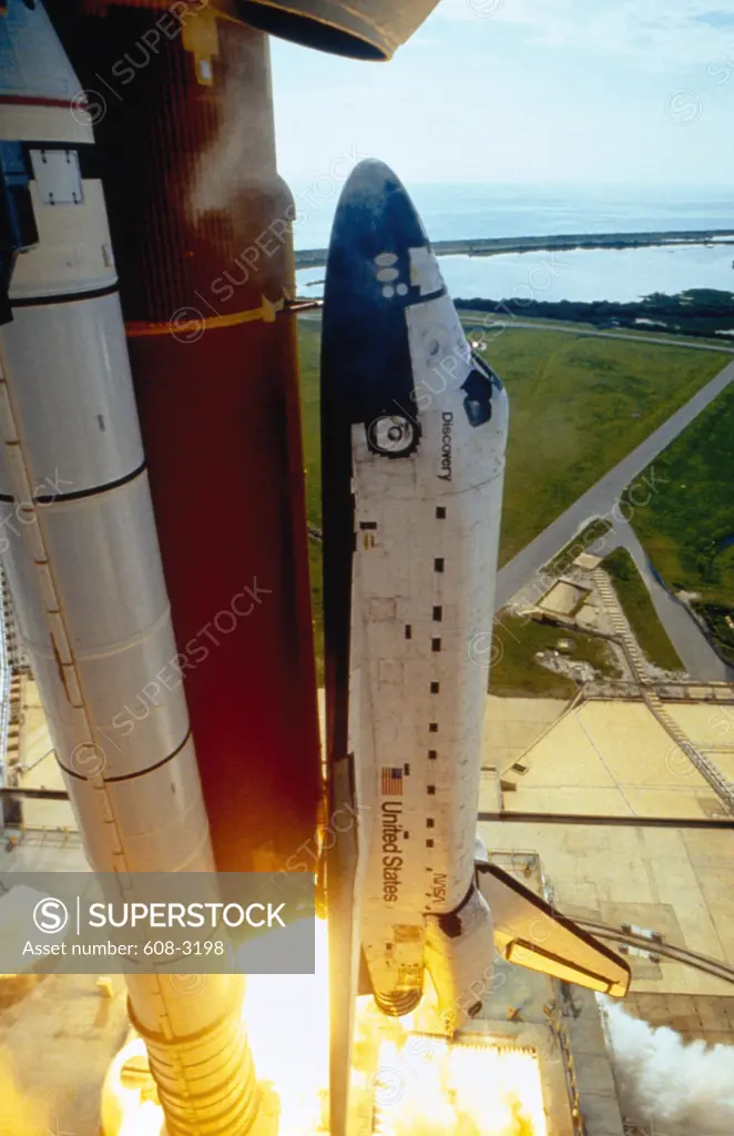 High angle view of a space shuttle taking off from a launch pad, Space Shuttle Discovery, Kennedy Space Center, Cape Canaveral, Florida, USA