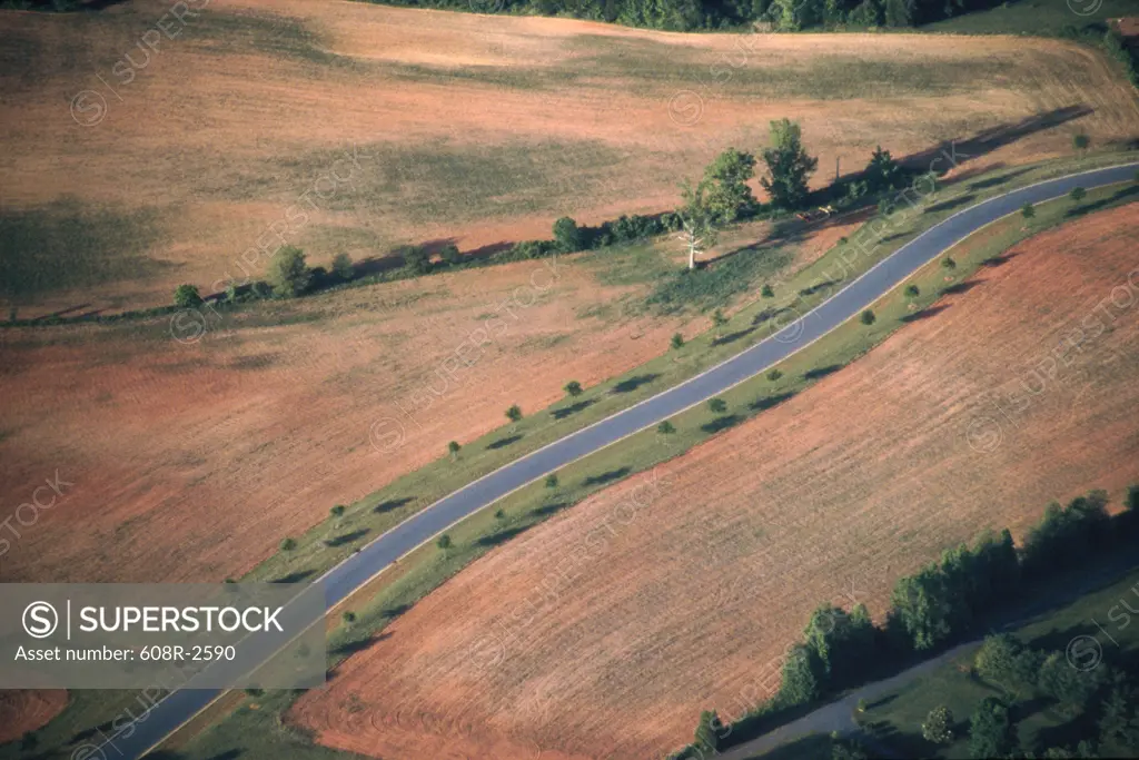 Aerial view of a road on farmland