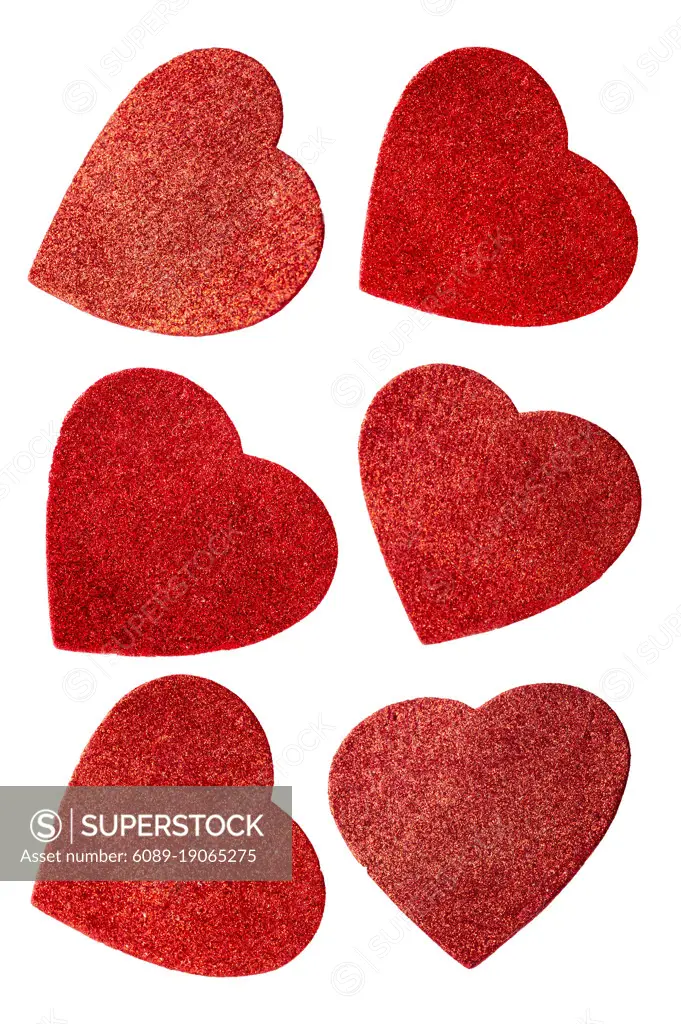 Set of red sparkling hearts isolated on the white, design element