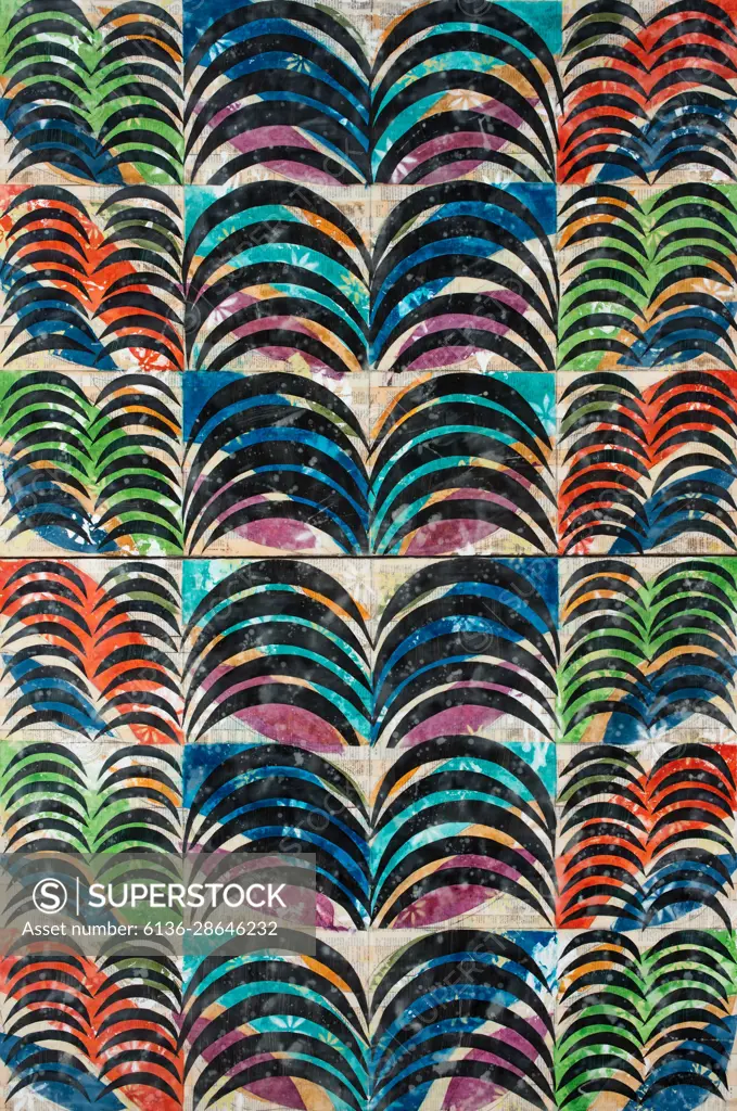 An arrangement of colorful, leaf-like shapes serve as a backdrop as black, arching marks dominate the surface of the painting creating a pattern that resembles the stripes on a tiger. 
