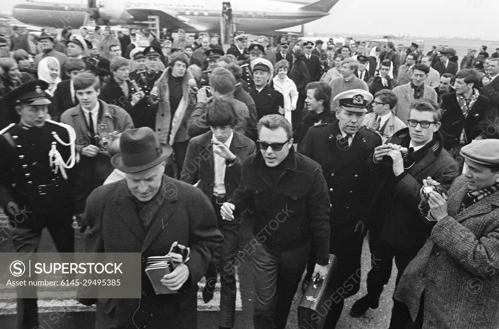 Anefo photo collection. Arrival Rolling Stones at Schiphol. March 26, 1966. Noord-Holland, Schiphol