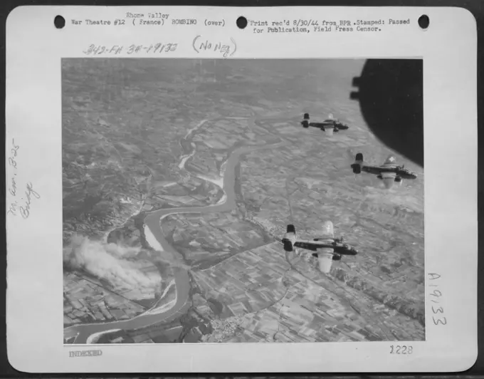 After Supporting The Beach Landings In Southern France On 'D' Day, North American B-25 Mitchells Of The Tactical Air Force Went On To Attack Axis Communications In The Rhone Valley. Here The Mitchells Are Coming Off Their Target, A Road Bridge 65 Miles N
