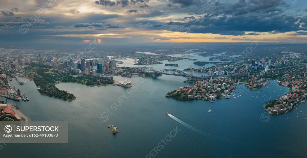 Aerial view of Sydney during cloudy sunset, Australia