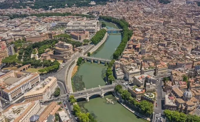 Aerial view of rooftops and river in Rome, Italy.