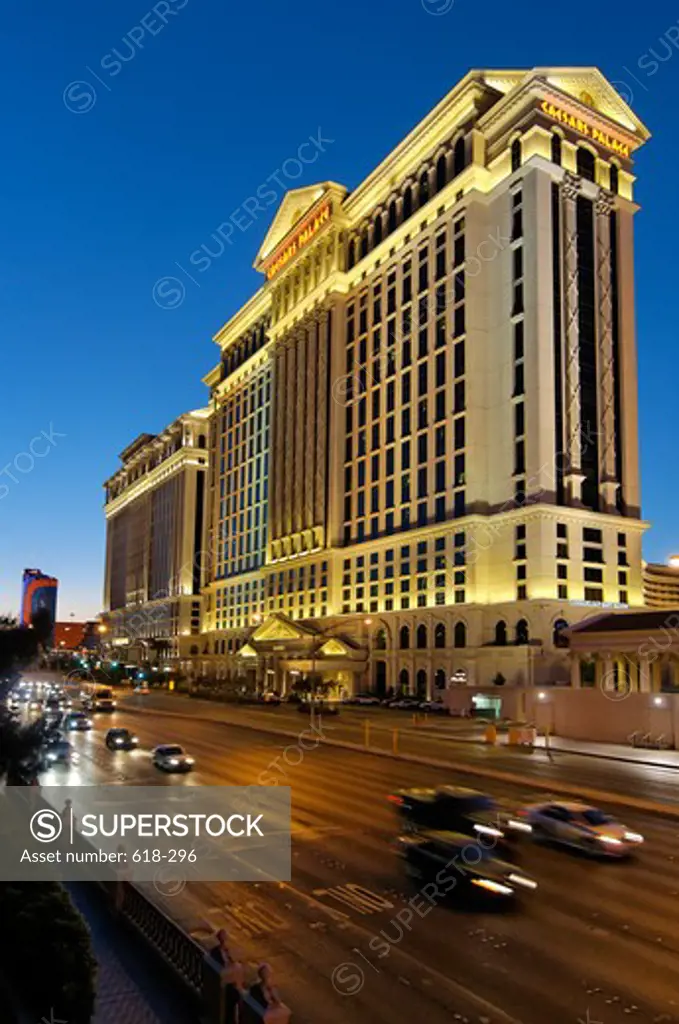 Luxury hotel at dusk, Caesars Palace, Flamingo Boulevard, Las Vegas, Nevada, USA