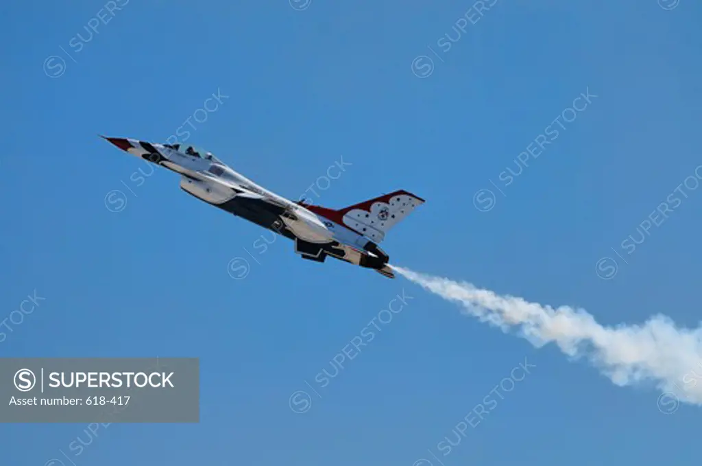 Thunderbirds F-16 fighter jet ascending towards the skies during the 2012 March Field Airfest in Riverside, California, USA