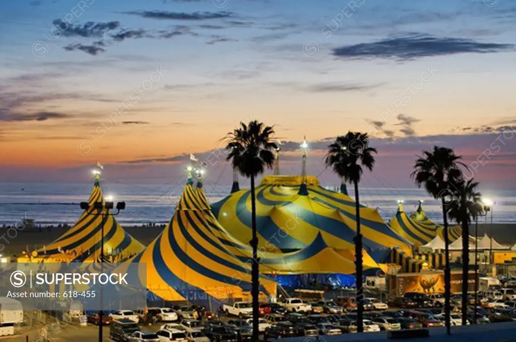 USA, California, Santa Monica, Striking blue and yellow tent tops of Cirque du Soleil, adorning Santa Monica Beach next to Santa Monica Pier, during their stay 2011 and 2012