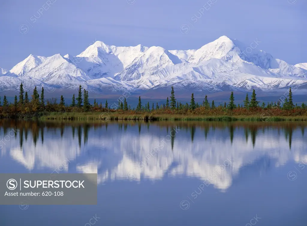 Snow covered mountains near a lake, Alaska, USA