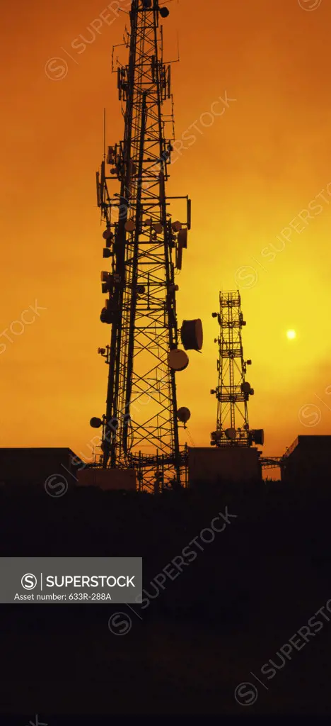 Silhouette of radio towers
