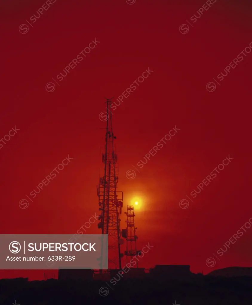 Silhouette of radio towers