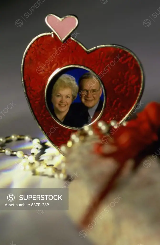 Photo of a senior couple in a picture frame