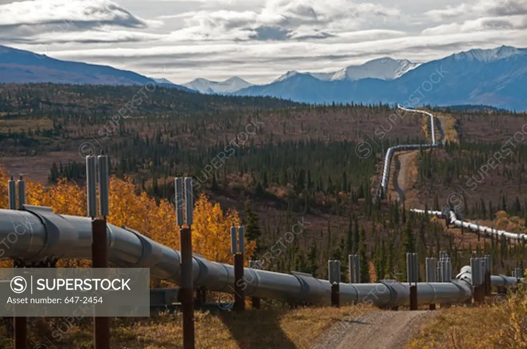 Alaska oil pipeline snaking into the distant mountains.