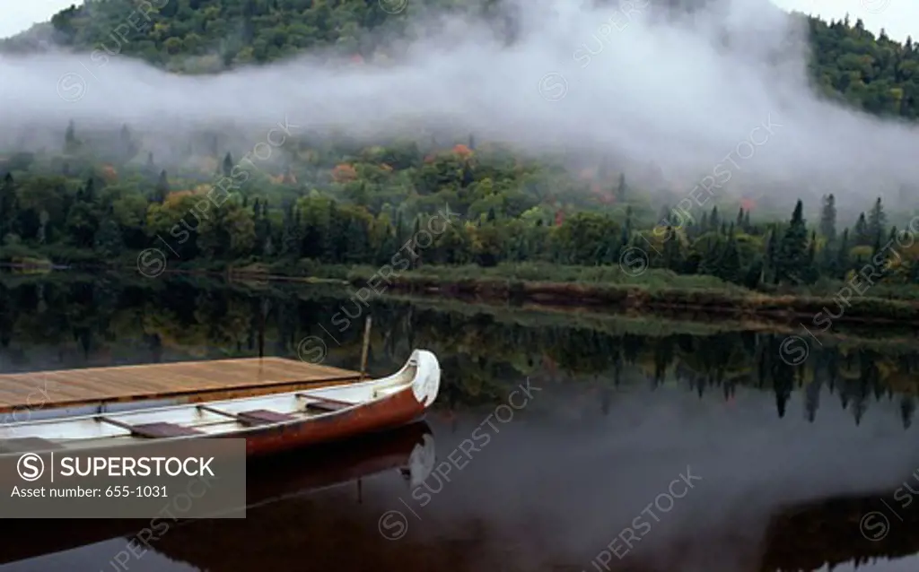 Boat moored at a pier, Jacques-Cartier River, Jacques-Cartier Provincial Park, Quebec, Canada