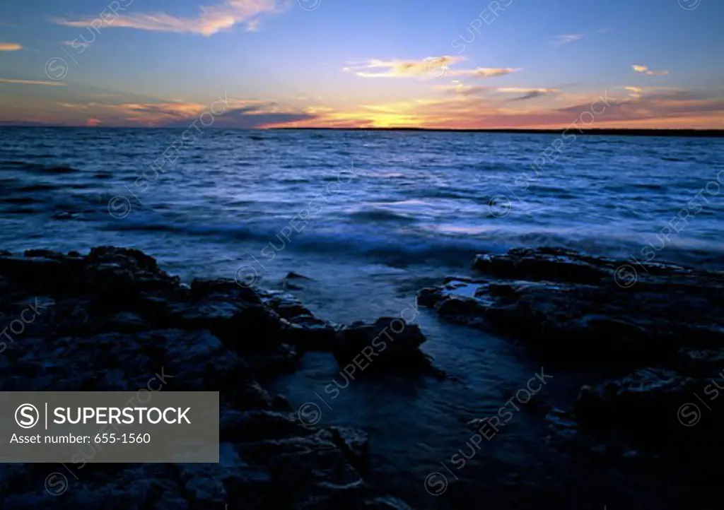 Sunset over a lake, Dorcas Bay, Lake Huron, Ontario, Canada