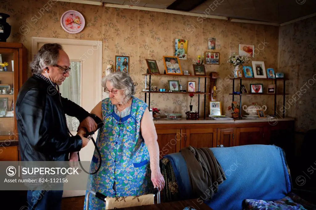 Photo essay on a country doctor in Picardie, France. He shares his time with consultations at his two offices and home visits. He has also launched an...