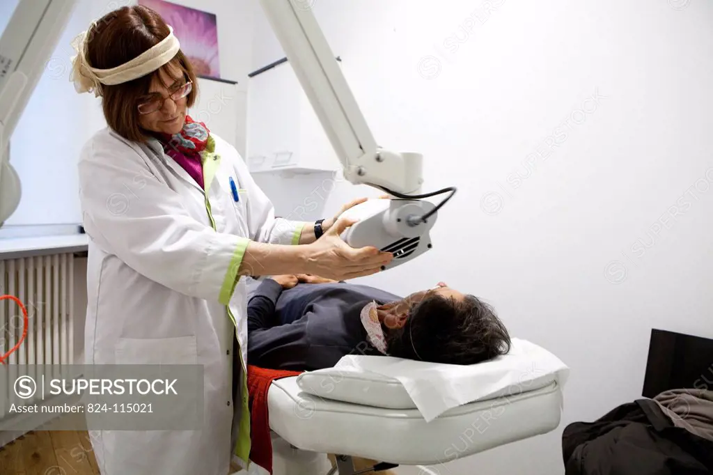 Reportage in a centre for esthetic medecine Paris. Preparing skin for the sun using cool light therapy or LED.