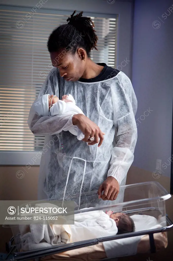 Photo essay at Saint Maurice hospital in France. Department of neonatology one week after the birth of the twins. The father is taking care of the twi...