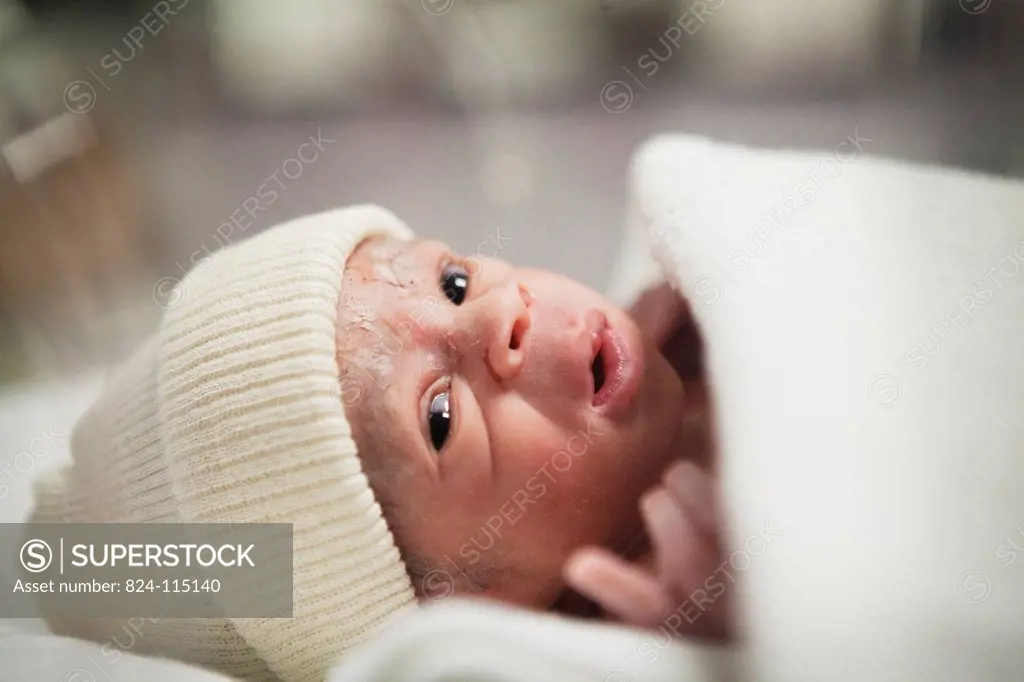 Photo essay at the maternity of Saint Maurice hospital in France. Birth of premature twins. After the childbirth the twins are placed in the departmen...