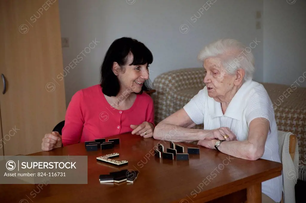 ELDERLY P. PLAYING A GAME