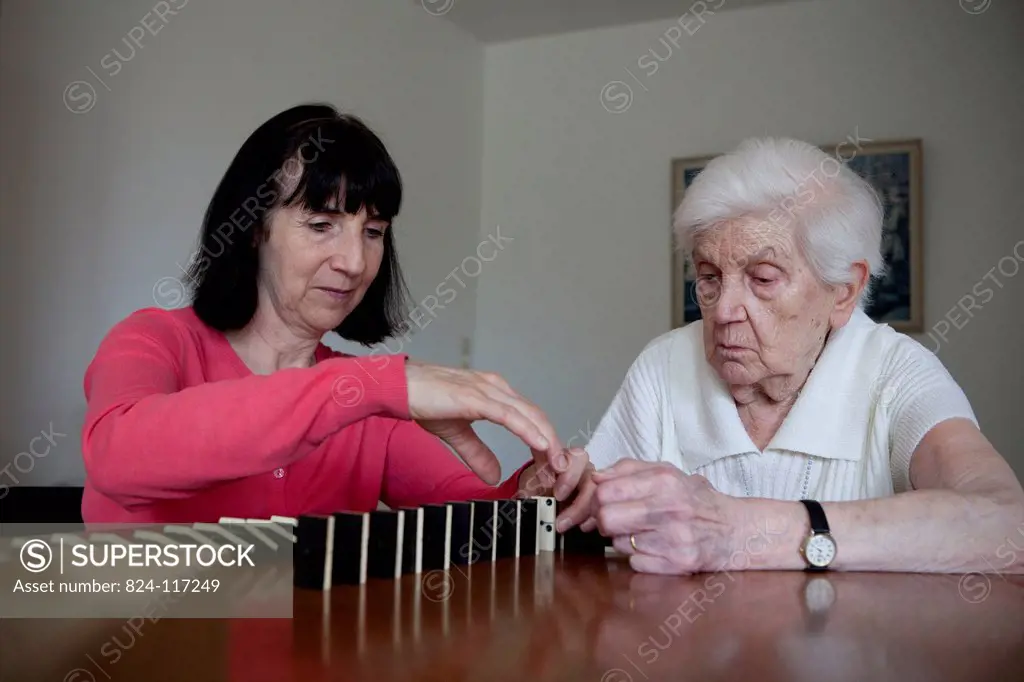 ELDERLY P. PLAYING A GAME