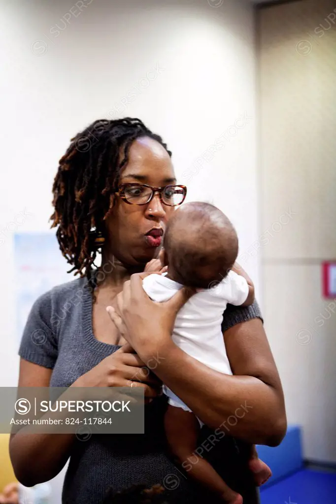 Reportage in a post_natal clinic in Champigny, France. Since leaving the neonatal unit, the twins 3_months old are checked every week to follow their ...